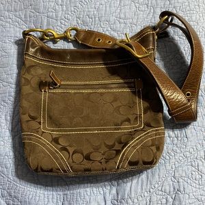 Real coach brown purse with leather strap